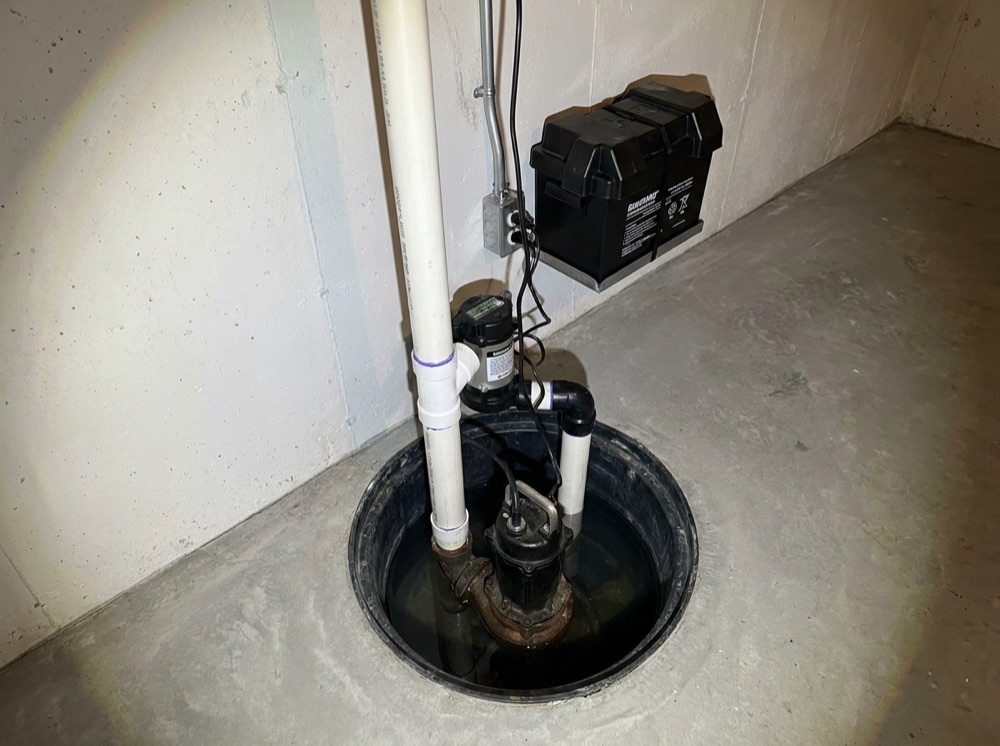 Installed sump pump and dry finished basement after waterproofing in Vancouver